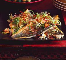 Sea bass with sizzled ginger, chilli & spring onions